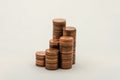 Growing mountain of coins in denomination of two euro cents on white background Royalty Free Stock Photo