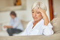 Growing older comes with some tough realities. a senior woman looking sad while sitting on the sofa at home. Royalty Free Stock Photo