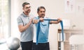 Growing stronger with every stretch. a senior man exercising with a resistance band during a rehabilitation session with