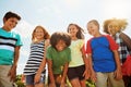 Growing up with the best group of friends. Portrait of a group of diverse and happy kids hanging out together on a