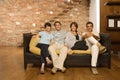 Grown up family on the sofa Royalty Free Stock Photo