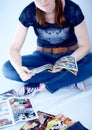 Adult woman reading comics books