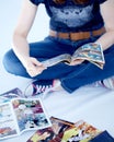 Adult woman reading comics books