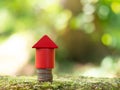 Growth coin stack with red house model. Savings budget plan for house. Investment mortgage fund finance property, home loan Royalty Free Stock Photo