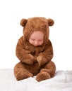 Growth, development and portrait for baby in studio with bear costume or pajamas against white backdrop. Boy, child or