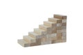 Tower of wooden blocks on a white background in the form of stairs. Royalty Free Stock Photo