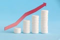 Growth graph made of stacked white pills Royalty Free Stock Photo