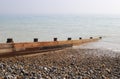 Groyne on shingle beach. UK Royalty Free Stock Photo