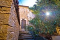 Groznjan cobbled street and old architecture at sunset view Royalty Free Stock Photo