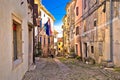 Groznjan cobbled street and old architecture view