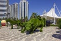 Grozny, Chechen Republic, Russia - august 12, 2019: Green animal sculptures and decorative arches in the Flower Park in the center