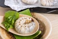 Grub Worms or Coconut Rhinoceros Beetle. Insects food for eating larvae fried or baked in spoon with vegetable on plate and on Royalty Free Stock Photo