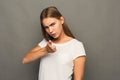 Grumpy girl pointing finger at camera Royalty Free Stock Photo