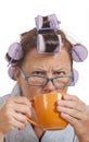 Grumpy Housewife Drinking Coffee Royalty Free Stock Photo