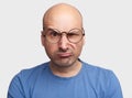 Grumpy man raising eyebrow, portrait Royalty Free Stock Photo