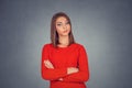 Grumpy skeptical woman in red dress Royalty Free Stock Photo