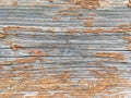 Grunge background. Peeling paint on an old wooden floor. Vintage wood background. Old Wood texture Royalty Free Stock Photo