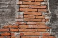 Grunge background, red brick wall texture bright plaster wall and blocks road sidewalk abandoned exterior urban background Royalty Free Stock Photo