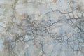 Grunge bare cracked concrete wall texture background.