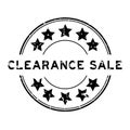 Grunge black clearance sale word with star icon round rubber stamp on white background