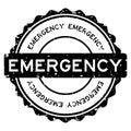 Grunge black emergency word round rubber stamp on white background