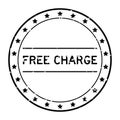 Grunge black free charge word round rubber stamp on white background