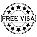 Grunge black free visa word with star icon round rubber stamp on white background Royalty Free Stock Photo