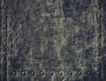 Grunge black metal plate with rivets screws background texture Royalty Free Stock Photo