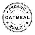 Grunge black premium quality oatmeal word round rubber stamp on white background