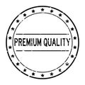 Grunge black premium quality word with star icon round rubber stamp on white background