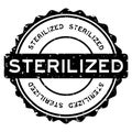 Grunge black sterilized word round rubber stamp on white background