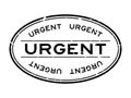 Grunge black urgent word oval rubber stamp on white background