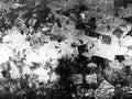 Grunge black and white pattern. Monochrome particles abstract texture. Background of cracks, scuffs, chips, stains, ink spots, Royalty Free Stock Photo