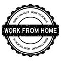 Grunge black work from home word round rubber stamp on white background