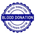 Grunge blue blood donation word round rubber stamp on white background Royalty Free Stock Photo