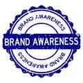 Grunge blue brand awareness word round rubber stamp on white background