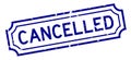 Grunge blue cancelled word rubber stamp on white background