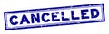 Grunge blue cancelled word square rubber stamp on white background