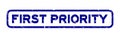 Grunge blue first priority word square rubber stamp on white background Royalty Free Stock Photo