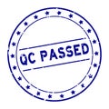 Grunge blue QC quality control passed word with star icon round rubber stamp on white background Royalty Free Stock Photo