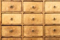 Old wooden drawer furniture ..Grunge box shaped storage with round brass handle in vintage shop Royalty Free Stock Photo