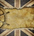 Grunge British flag and old steering wheel Royalty Free Stock Photo