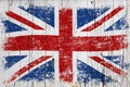 Grunge British flag over old white painted wood