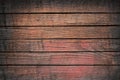 Grunge brown and red wooden planks, tabletop, floor surface, wall.