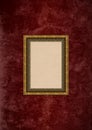 Grunge brown stucco wall with empty picture frame Royalty Free Stock Photo