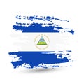Grunge brush stroke with Nicaragua national flag