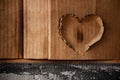 Grunge Burnt Heart on Corrugated Paper Texture Background Royalty Free Stock Photo