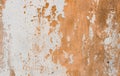 Cement orange, embossed, rough texture with shabby white paint, plaster