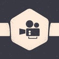 Grunge Cinema camera icon isolated on grey background. Video camera. Movie sign. Film projector. Monochrome vintage Royalty Free Stock Photo