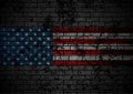 Grunge concept USA flag on black brick wall background Royalty Free Stock Photo